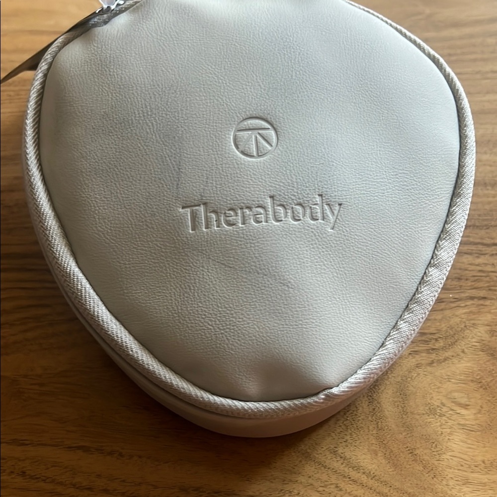 Therabody White Travel Pouches not opened!  Amenities kit
